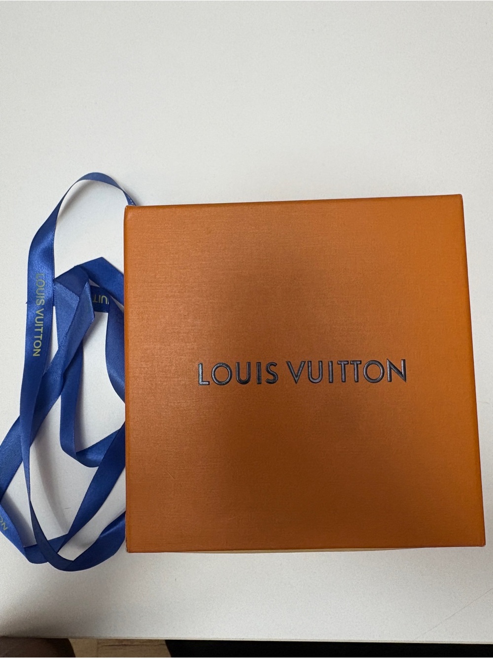 Louis Vuitton box, ribbon & dust bag.